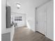 Laundry room with wood-look floors and white door at 16247 Lake Johns Cir, Winter Garden, FL 34787