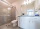 Clean bathroom with a shower/tub combo and white cabinets at 17791 Passionflower Cir, Clermont, FL 34714