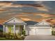 Attractive one-story home with a two-car garage and landscaping at 17791 Passionflower Cir, Clermont, FL 34714