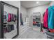 Spacious walk-in closet with ample shelving and hanging space at 17791 Passionflower Cir, Clermont, FL 34714