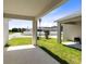 Covered patio with a view of the community and surrounding landscape at 2340 Grasmere View S Pkwy, Kissimmee, FL 34746