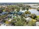 Aerial view of community, showing buildings, pool, and lake at 2592 Grassy Point Dr # 106, Lake Mary, FL 32746