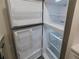 Stainless steel refrigerator with ample storage space at 2592 Grassy Point Dr # 106, Lake Mary, FL 32746