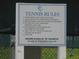 Tennis court rules and hours are clearly displayed on this sign at 2592 Grassy Point Dr # 106, Lake Mary, FL 32746