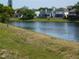 Scenic water view showcasing the peaceful and picturesque setting of the community at 2592 Grassy Point Dr # 106, Lake Mary, FL 32746