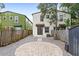 Backyard view of home with patio and fence at 2607 E Jefferson St, Orlando, FL 32803