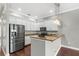 Modern kitchen with stainless steel appliances and granite countertops at 2607 E Jefferson St, Orlando, FL 32803