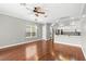 Spacious living room featuring hardwood floors and a ceiling fan at 2607 E Jefferson St, Orlando, FL 32803