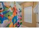 Small bathroom with shower and Disney-themed shower curtain at 2715 Manesty Ln, Kissimmee, FL 34747