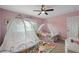 Bedroom with two twin beds and princess theme at 2715 Manesty Ln, Kissimmee, FL 34747