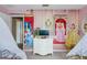 Bedroom with princess-themed mural and dresser at 2715 Manesty Ln, Kissimmee, FL 34747