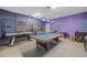 Game room includes pool table, foosball, and air hockey at 2715 Manesty Ln, Kissimmee, FL 34747