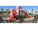 Enclosed playground with castle-themed playset and slides at 2715 Manesty Ln, Kissimmee, FL 34747