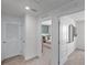 Bright hallway with doors leading to bedrooms at 2781 Flushing Dr, Apopka, FL 32703