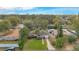 Aerial view of a house with a large backyard and driveway at 2842 Eastern Pkwy, Winter Park, FL 32789