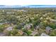 Aerial view showing a residential area with tree-lined streets and a mix of house styles at 2842 Eastern Pkwy, Winter Park, FL 32789