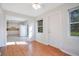 Bright dining area with hardwood floors and kitchen access at 2842 Eastern Pkwy, Winter Park, FL 32789