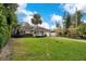 Charming ranch home with stone exterior, spacious yard, and a two-car driveway at 2842 Eastern Pkwy, Winter Park, FL 32789