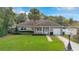 Charming single-story house with stone accents and a basketball hoop at 2842 Eastern Pkwy, Winter Park, FL 32789