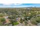 Wide aerial view of a neighborhood with lush trees and houses at 2842 Eastern Pkwy, Winter Park, FL 32789