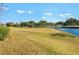 Picturesque golf course view with water features at 300 Sorrento Rd, Poinciana, FL 34759