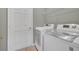 Laundry room with side-by-side washer and dryer at 306 Kettering Rd, Davenport, FL 33897