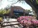 Plant Street Market storefront with brick facade and azaleas at 322 Apopka St, Winter Garden, FL 34787