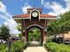 Winter Garden, FL town arch with clock tower and landscaping at 322 Apopka St, Winter Garden, FL 34787