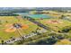 Aerial view of multiple baseball fields and parking areas in a park at 332 Apopka Hills Cir, Apopka, FL 32703