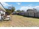 Fenced backyard with patio and grassy area at 332 Apopka Hills Cir, Apopka, FL 32703