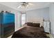 Bedroom with a queen-size bed and blue dresser at 332 Apopka Hills Cir, Apopka, FL 32703