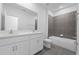 Main bathroom with a bathtub, toilet and double vanity at 360 Belmond Dr, Debary, FL 32713