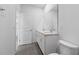 Bathroom with double vanity and gray tile flooring at 360 Belmond Dr, Debary, FL 32713