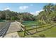 Wooden dock with wooden railings over calm water at 360 Belmond Dr, Debary, FL 32713