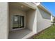 Covered patio with sliding glass doors and a view of the backyard at 360 Belmond Dr, Debary, FL 32713