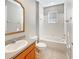 Clean bathroom with a tub, toilet and sink at 4957 Rock Rose Loop, Sanford, FL 32771