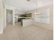 Kitchen with stainless steel appliances and dark cabinets at 4957 Rock Rose Loop, Sanford, FL 32771