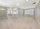 Bright and airy living area with tile flooring and open floor plan at 4957 Rock Rose Loop, Sanford, FL 32771