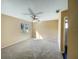 Well-lit bedroom with carpeted floors and a ceiling fan at 511 Cloudcroft Dr, Deltona, FL 32738