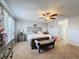 Bright bedroom featuring a king-size bed and ample space at 5417 Calla Lily Ct, Kissimmee, FL 34758