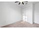 Well-lit bedroom featuring a large closet and carpet at 58 Bonita Rd, Debary, FL 32713