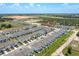 Aerial view of a large community of townhouses at 5912 Piney Shrub Pl, Saint Cloud, FL 34771