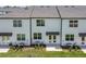 Aerial view of townhouses and backyard at 5912 Piney Shrub Pl, Saint Cloud, FL 34771