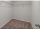 Walk-in closet with wire shelving at 5912 Piney Shrub Pl, Saint Cloud, FL 34771