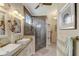 Elegant bathroom with double sinks, large shower, and updated fixtures at 5942 Nw 26Th Ln, Ocala, FL 34482