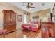 Main bedroom with wood floors and armoire at 5942 Nw 26Th Ln, Ocala, FL 34482