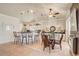 Kitchen dining area with glass table and fireplace at 5942 Nw 26Th Ln, Ocala, FL 34482