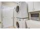 Laundry room with stacked washer and dryer at 5942 Nw 26Th Ln, Ocala, FL 34482