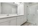 Modern bathroom boasts double vanity and a glass shower at 597 Lost Shaker Way, Daytona Beach, FL 32124