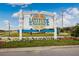 Latitude Margaritaville community entrance sign with landscaping at 597 Lost Shaker Way, Daytona Beach, FL 32124